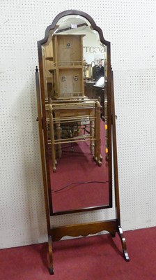 Lot 625 - A mahgoany framed cheval mirror with arched...