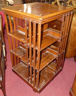 Lot 632 - A circa 1900 mahogany three-tier revolving...
