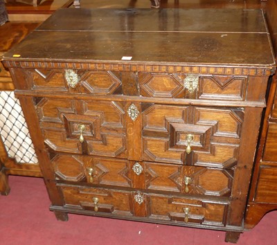 Lot 638 - A Jacobean period oak chest of two short and...
