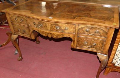 Lot 643 - A George V figured walnut and cross banded...