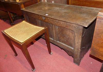 Lot 675 - A 19th century oak slope front writing bureau,...