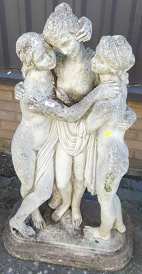 Lot 709 - A reconstituted stone garden figure group 'The...
