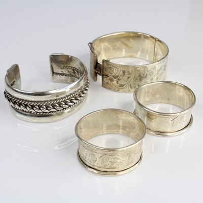 Lot 384 - A silver and engraved hinged bangle d. 6cm...