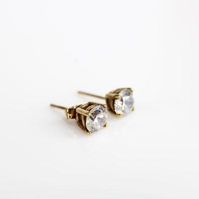 Lot 386 - A pair of 9ct gold and cz set ear studs