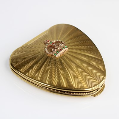 Lot 371 - A gilt metal and engine turned lady's heart...