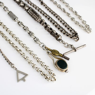 Lot 353 - A silver curb link watch chain with Albert and...