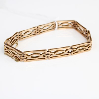 Lot 363 - A 9ct gold gate link bracelet with safety...