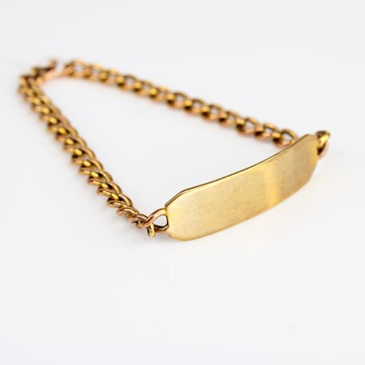 Lot 370 - A modern 9ct gold curb link identity bracelet,...