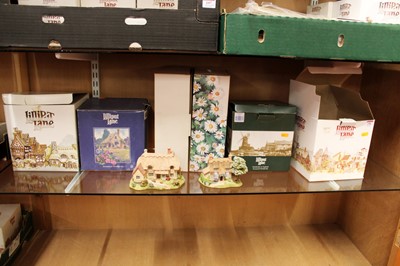 Lot 198 - A collection of LililPutt Lane model cottages,...