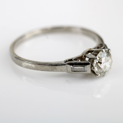 Lot 339 - An Art Deco platinum diamond solitaire ring,...