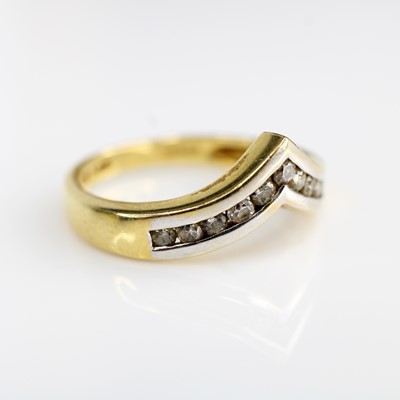 Lot 347 - An 18ct gold diamond wishbone ring, channel...