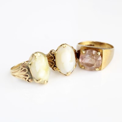 Lot 348 - A modern 9ct  gold amethyst? set dress ring,...