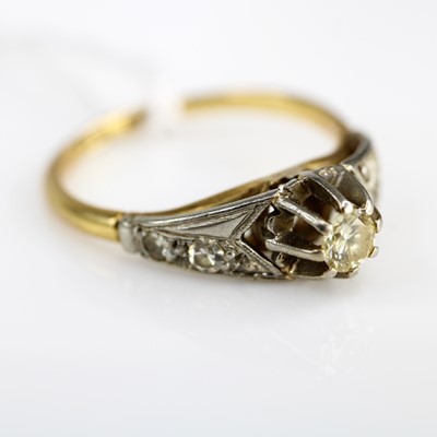 Lot 349 - A 9ct gold and platinum diamond solitaire ring,...