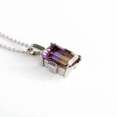 Lot 2135 - An 18ct white gold ametrine and diamond...