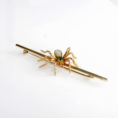 Lot 2159 - A yellow metal spider bar brooch, having a 7.8...