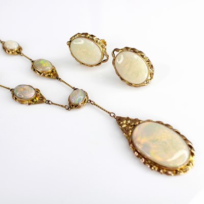 Lot 133 - A yellow metal opal necklace and earring suite,...