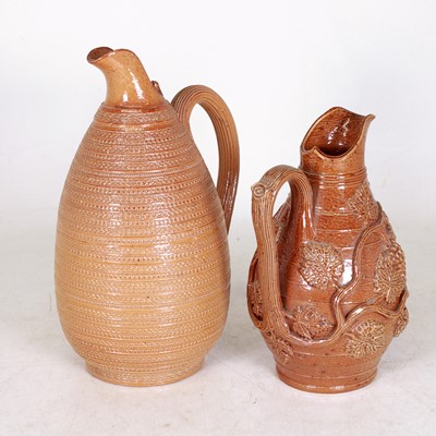 Lot 228 - A 19th century salt glazed stoneware jug...