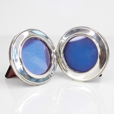 Lot 303 - A pair of Elizabeth II silver mounted circular...