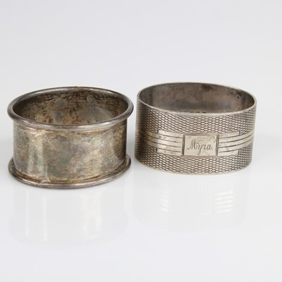 Lot 319 - An Art Deco silver napkin ring, having engine...