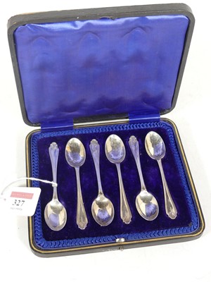 Lot 327 - A cased set of six George V silver teaspoons,...