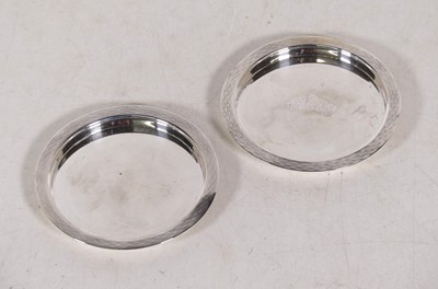 Lot 306 - A pair of George VI silver circular pin trays,...