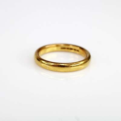 Lot 2123 - A 22ct gold court shaped wedding band, sponsor...