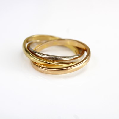 Lot 2124 - An 18ct three-colour gold 'Russian' wedding...