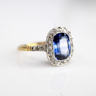 Lot 2082 - A yellow and white metal sapphire and diamond...