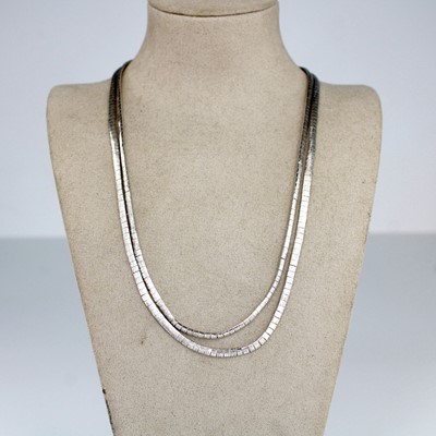 Lot 2117 - A modern continental white metal and sapphire...