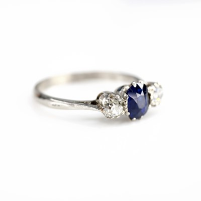 Lot 2075 - A white metal sapphire and diamond 3 stone...
