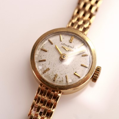 Lot 2091 - A lady's Longines 9ct gold cased bracelet...