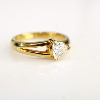 Lot 2178 - A yellow metal diamond solitaire ring...