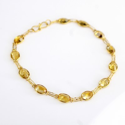 Lot 2121 - A contemporary yellow metal and citrine set...