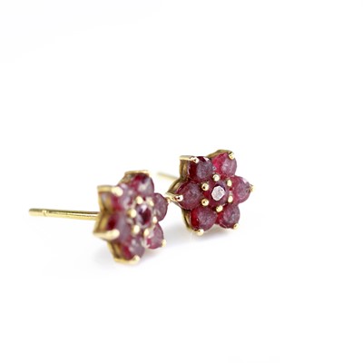 Lot 2102 - A pair of Far Eastern yellow metal ruby set...