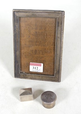 Lot 312 - A George V silver-clad photograph frame, of...