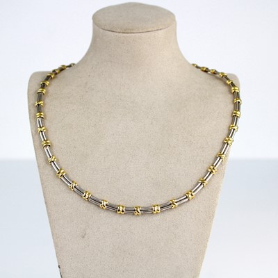 Lot 2222 - An 18ct yellow and white gold necklace,...
