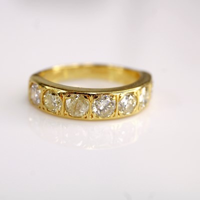 Lot 2112 - An 18ct gold diamond half eternity ring,...