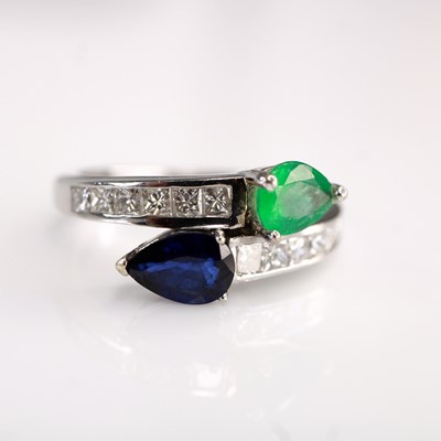Lot 2119 - A contemporary white metal, emerald, sapphire...