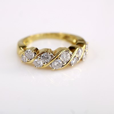 Lot 2197 - A contemporary 18ct yellow gold diamond...