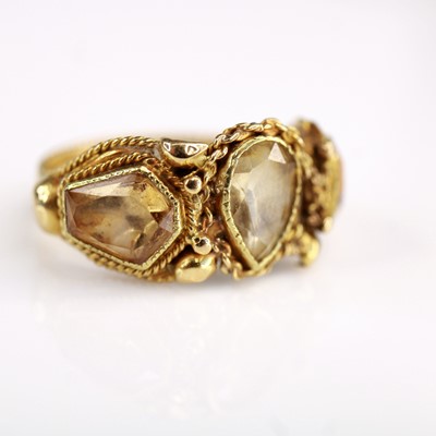 Lot 2199 - A late Georgian yellow metal topaz set band...