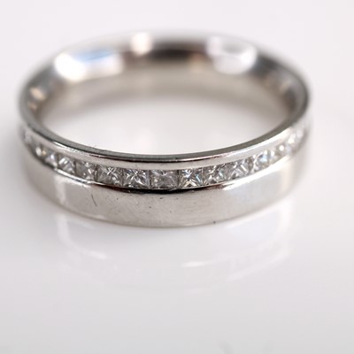 Lot 2226 - A platinum diamond set eternity ring,...