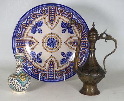 Lot 7 - A Persian pottery charger dia. 43cm, together...