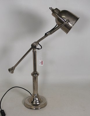 Lot 8 - A polished metal weighted desk lamp, h.70cm