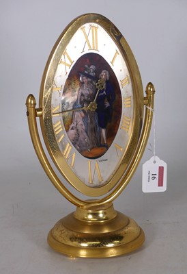 Lot 16 - A gilt lacquered mantel clock, having an...