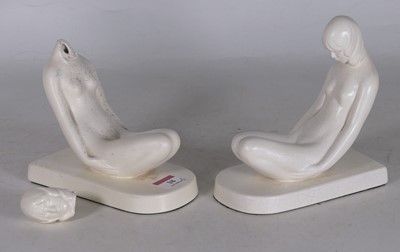 Lot 18 - A pair of Wedgwood figural bookends, cream...
