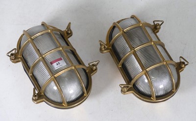 Lot 45 - A pair of reproduction brass and glass wall...