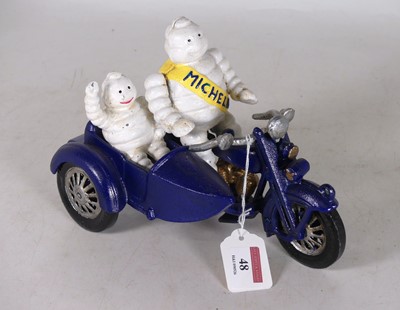 Lot 48 - A reproduction cast iron Michelin Man...