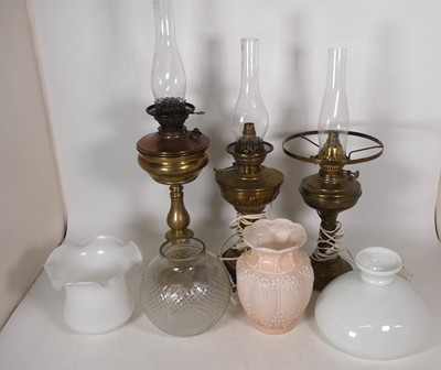 Lot 58 - A Victorian brass pedestal oil lamp (converted...