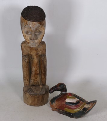 Lot 59 - A carved and polychrome painted hardwood decoy...