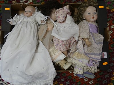 Lot 84 - Four various modern porcelain dolls with dresses